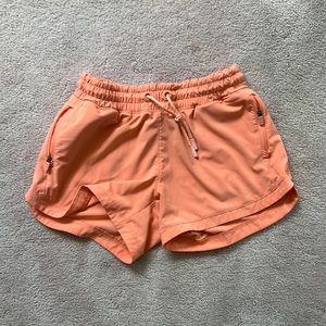 peach/coral girls athleta shorts size 12